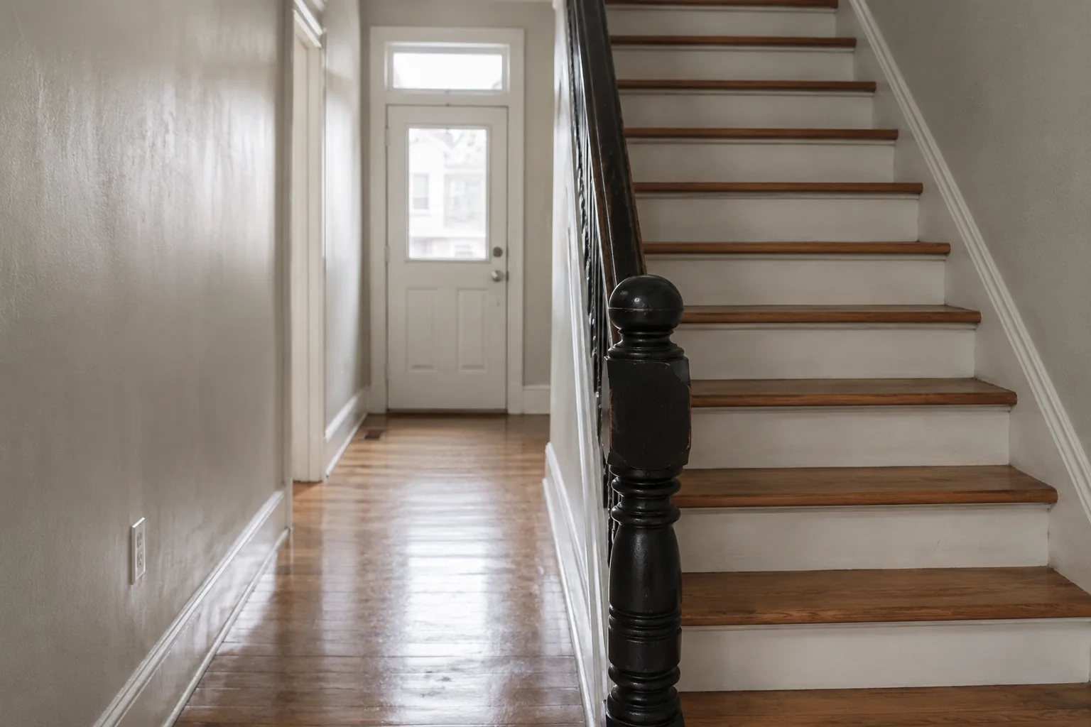 Entry hall and staircase cleaned in a rowhouse